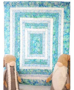 Seeing Double Reversible Throw Quilts Bag Pattern by Aunties Two - Completed quilt in blues and white