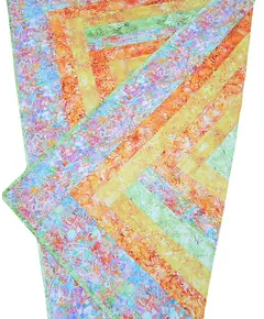 Seeing Double Reversible Throw Quilts Bag Pattern by Aunties Two - Completed quilt on pattern cover