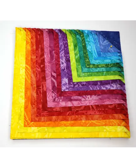 Rainbow 40 x 10" Fabric Squares AKA Layer Cake 
by Batiks Australia - Image of the Precut Fabric Selection