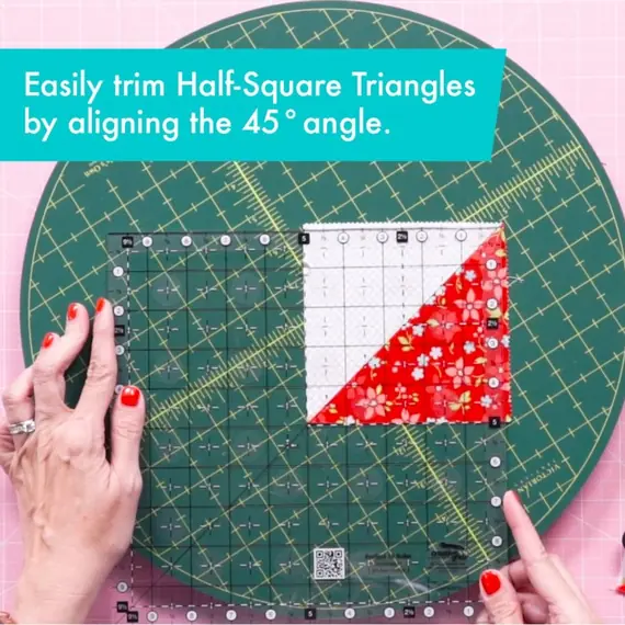 Creative Grids Perfect 10 Ruler CGRPERF10  - Image depicting trimming 1/2 square triangles